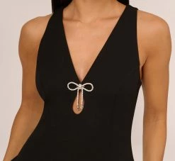 Sleeveless Crepe Mini Dress With Rhinestone Bow Accent In Black 9 Sleeveless Crepe Mini Dress With Rhinestone Bow Accent In Black -Adrianna Papell Shop MN1E208600 AA002 Regular Detail